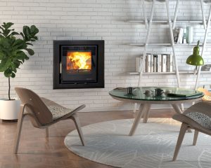 A lighting Eco C550 6.9kW multi fuel cassette stove with 4 sided frame.